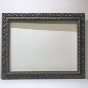 Cornice lavorata grigia