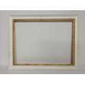 Cornice nera guscia lavorata foglia oro