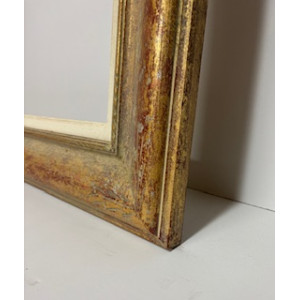 Cornice bordeaux e foglia oro con intagli sugli angoli