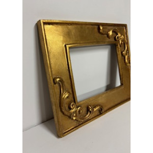 Cornice oro con fregi