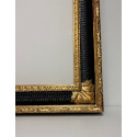 Cornice nera e doppio filo oro