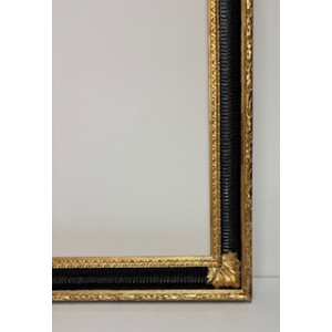 Cornice nera e oro foglia con fregi
