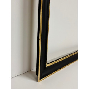 Cornice nera e oro