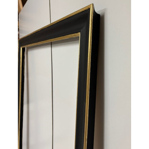 Cornice nera e oro