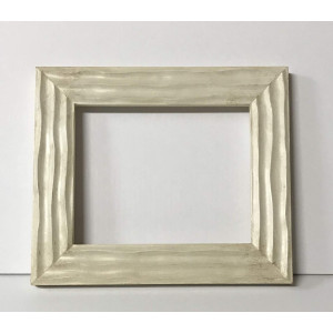 Cornice onde avorio e oro chiaro